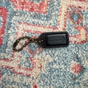 Coach black leather vintage tag